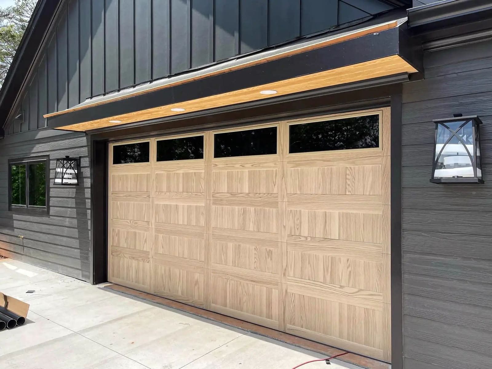 Wood-look garage door on a contemporary home