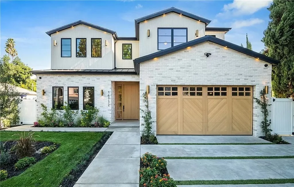Custom wood garage door for traditional home