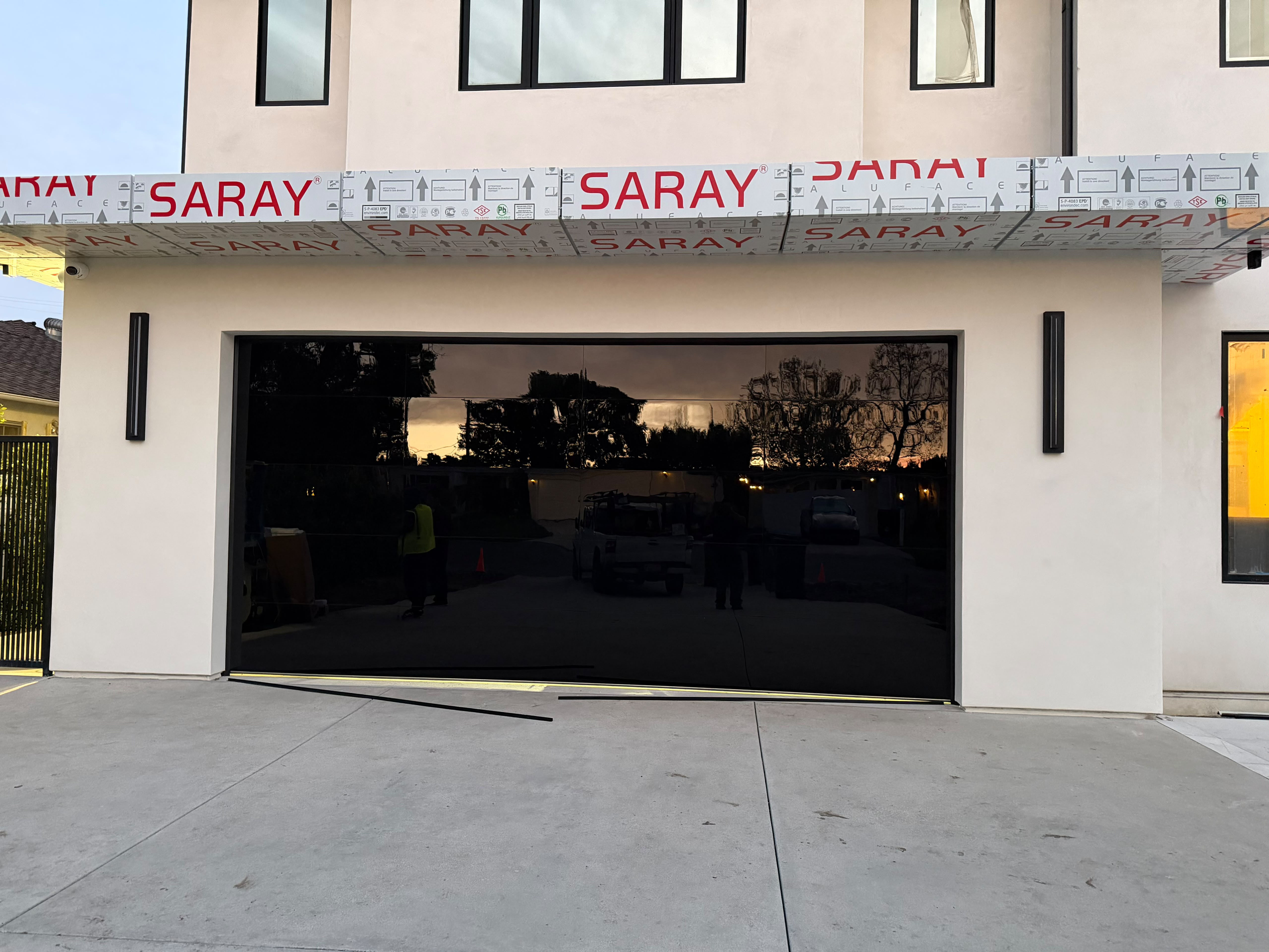 Dark frameless-appearance custom garage door